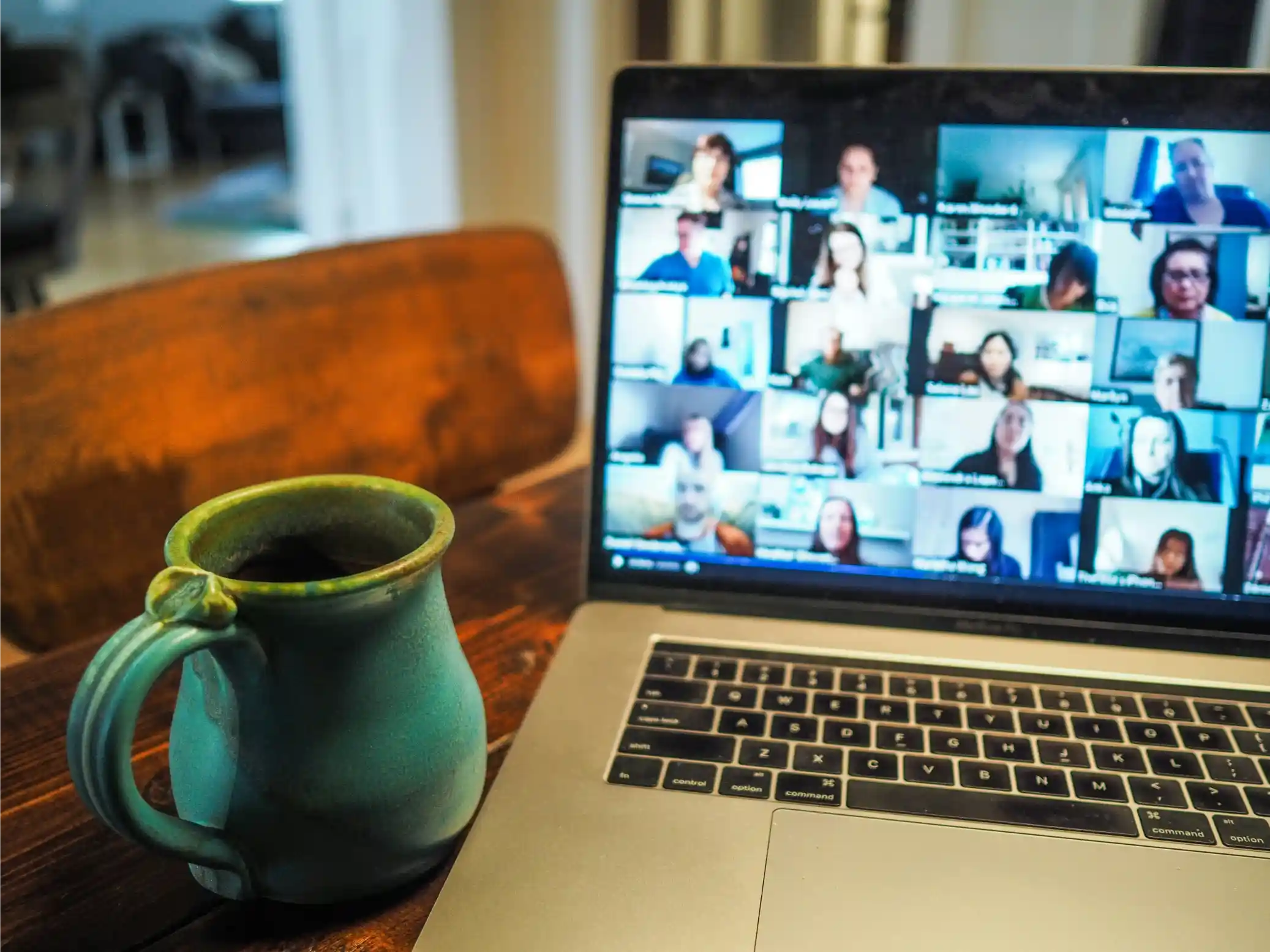 video conference with a laptop on a table